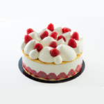 Framboisier à partager garni de framboises fraîches et de crème vanille, pâtisserie La Vaina